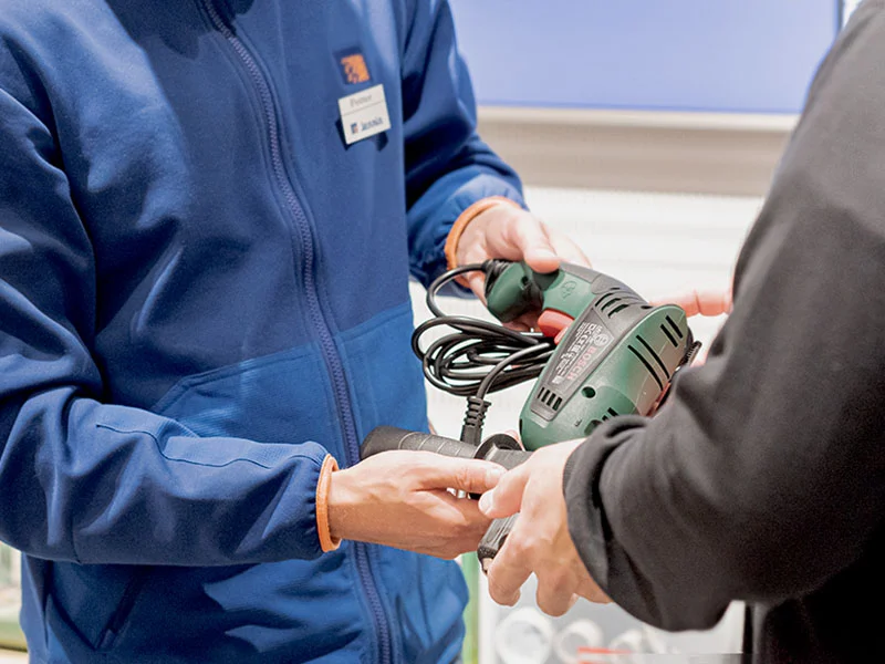 Employee helping with rental