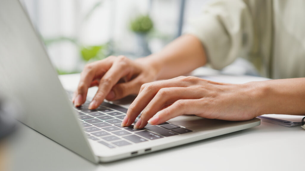 Working with a laptop in the living room at home