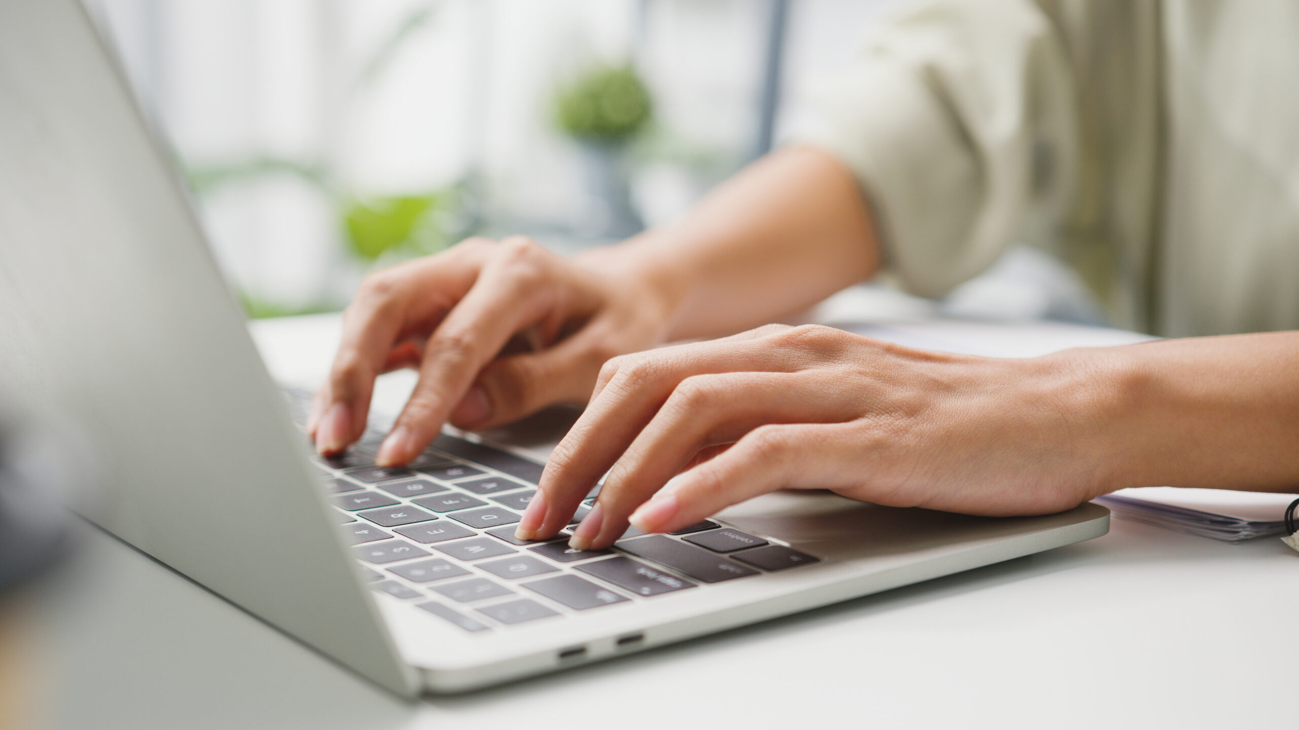 Working with a laptop in the living room at home