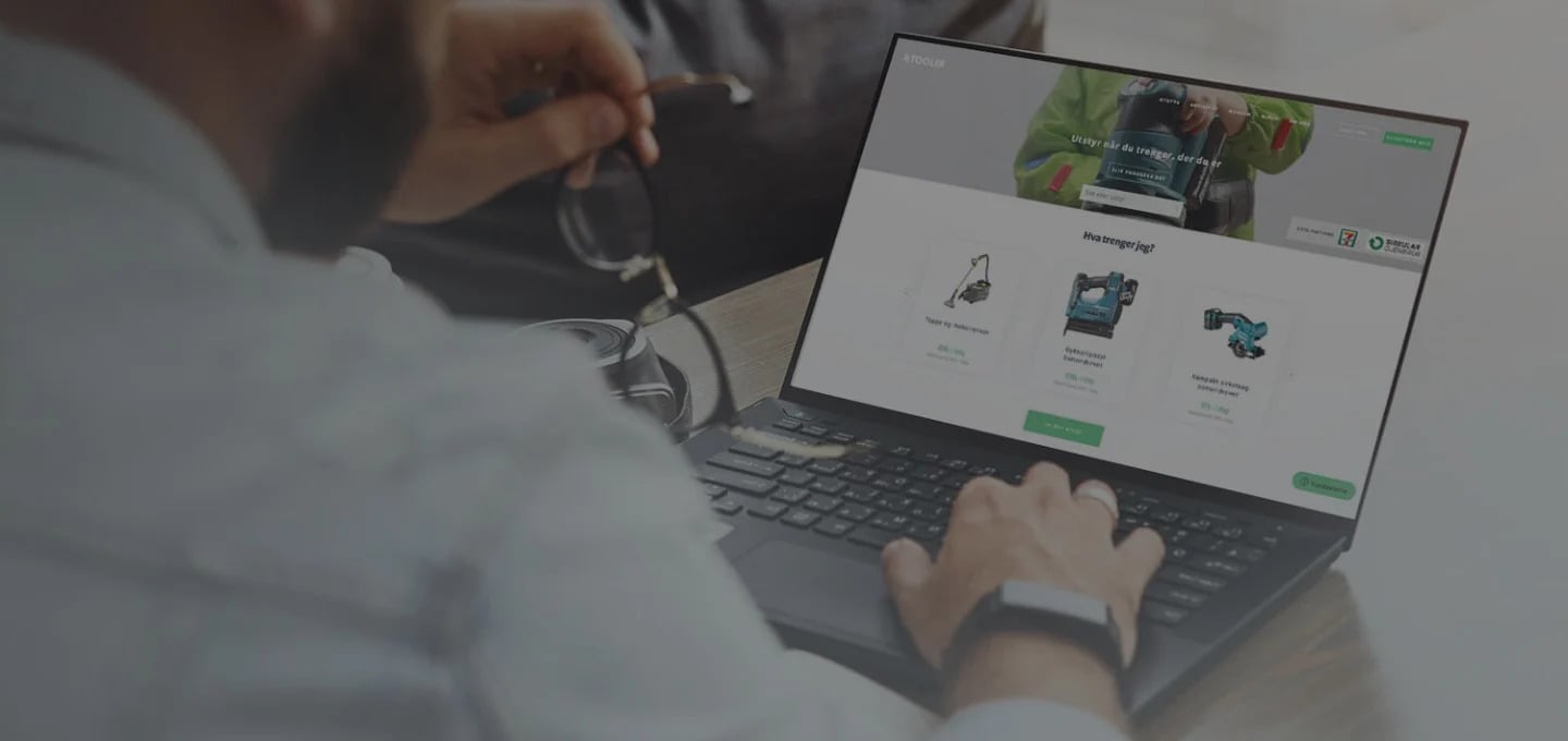 man looking at self-service rental website