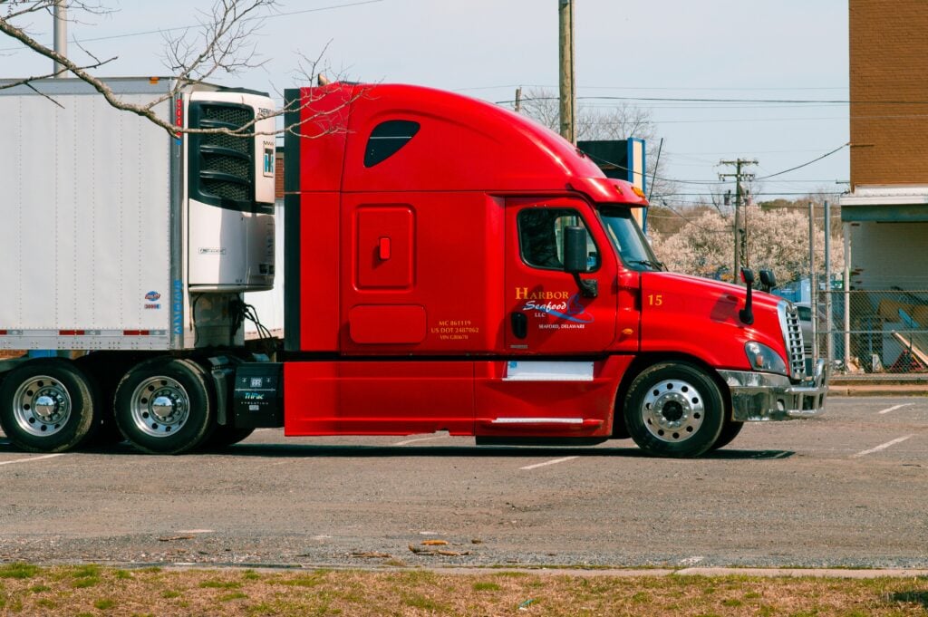 Red semi-truck refrigerated trailer
