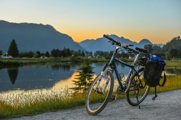 Bicycle by a lakeside at sunset
