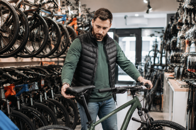 Customer in bicycle rental shop